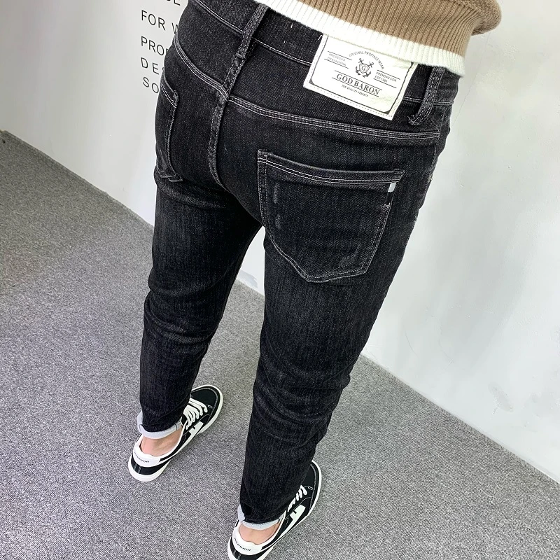 黑色刺绣牛仔裤男2025秋冬新款潮牌水洗休闲百搭韩版修身九分裤子