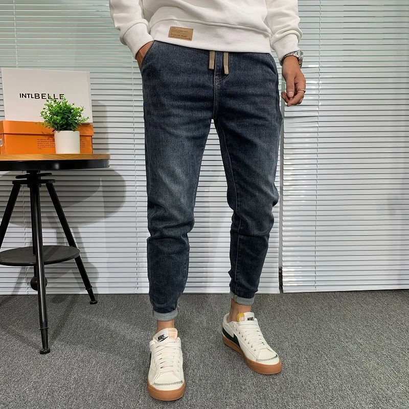 松紧腰九分牛仔裤男秋冬新款韩版潮流修身小脚斜口袋简约抽绳长裤