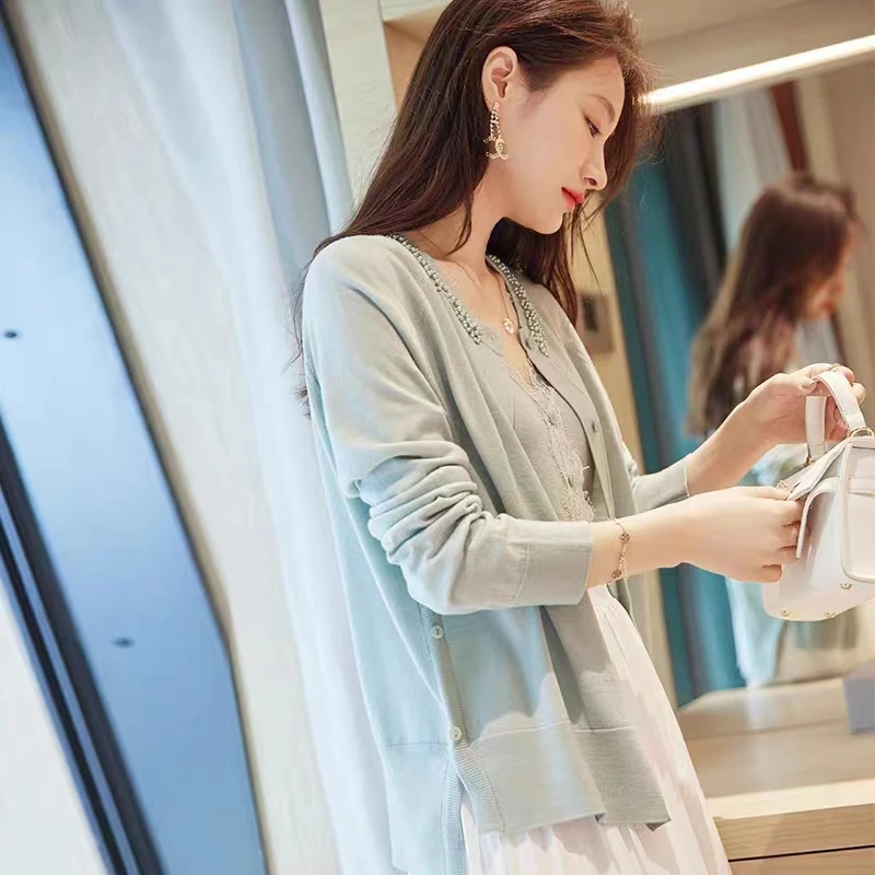 2023春季新款圆领手工订珠针织开衫女时尚百搭设计感气质针织衫