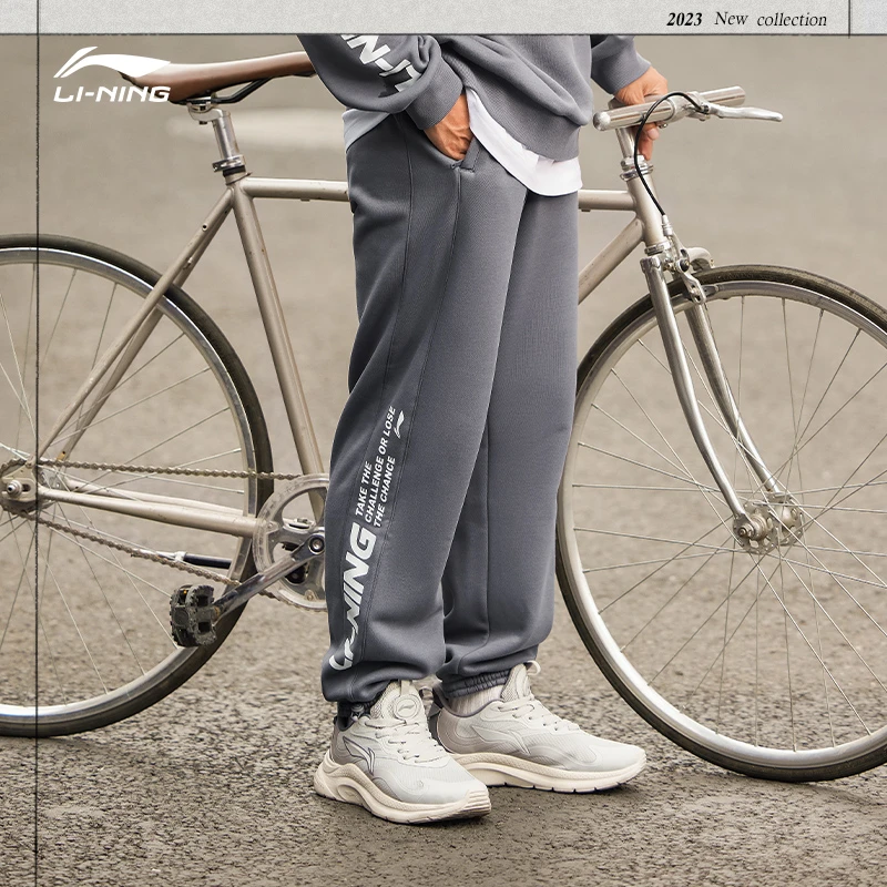 李宁男子运动生活系列冬季字母保暖时尚舒适日常束脚长裤AKLTB11