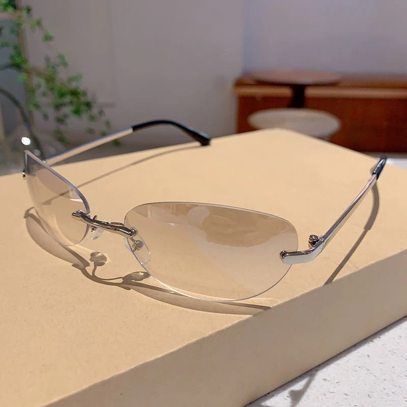 复古无框椭圆太阳镜女时尚潮流YK未来风辣妹街拍凹造型防晒墨镜