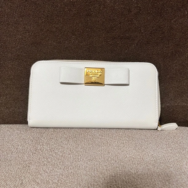 95新 Prada/普拉达 蝴蝶结手拿包 鱼鱼