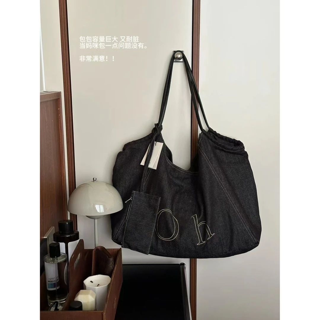 韩系复古牛仔布托特包女2025新款大容量字母单肩包通勤腋下妈咪包