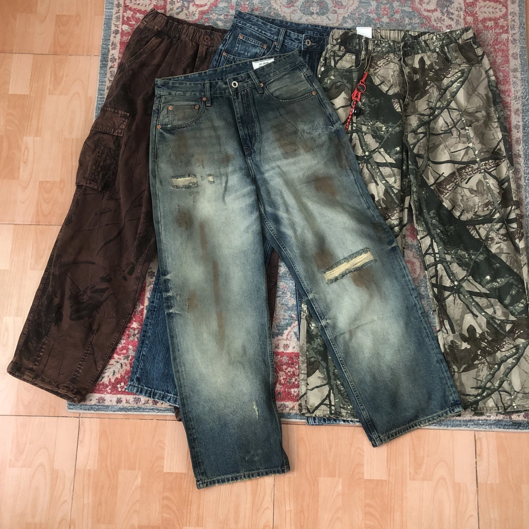 潮集势商店破洞复古水洗脏染牛仔裤7013