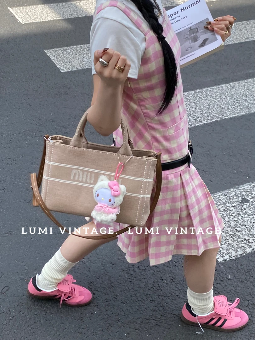 95新 MIU MIU/缪缪 粉色单宁小号沙滩包单肩包31580997