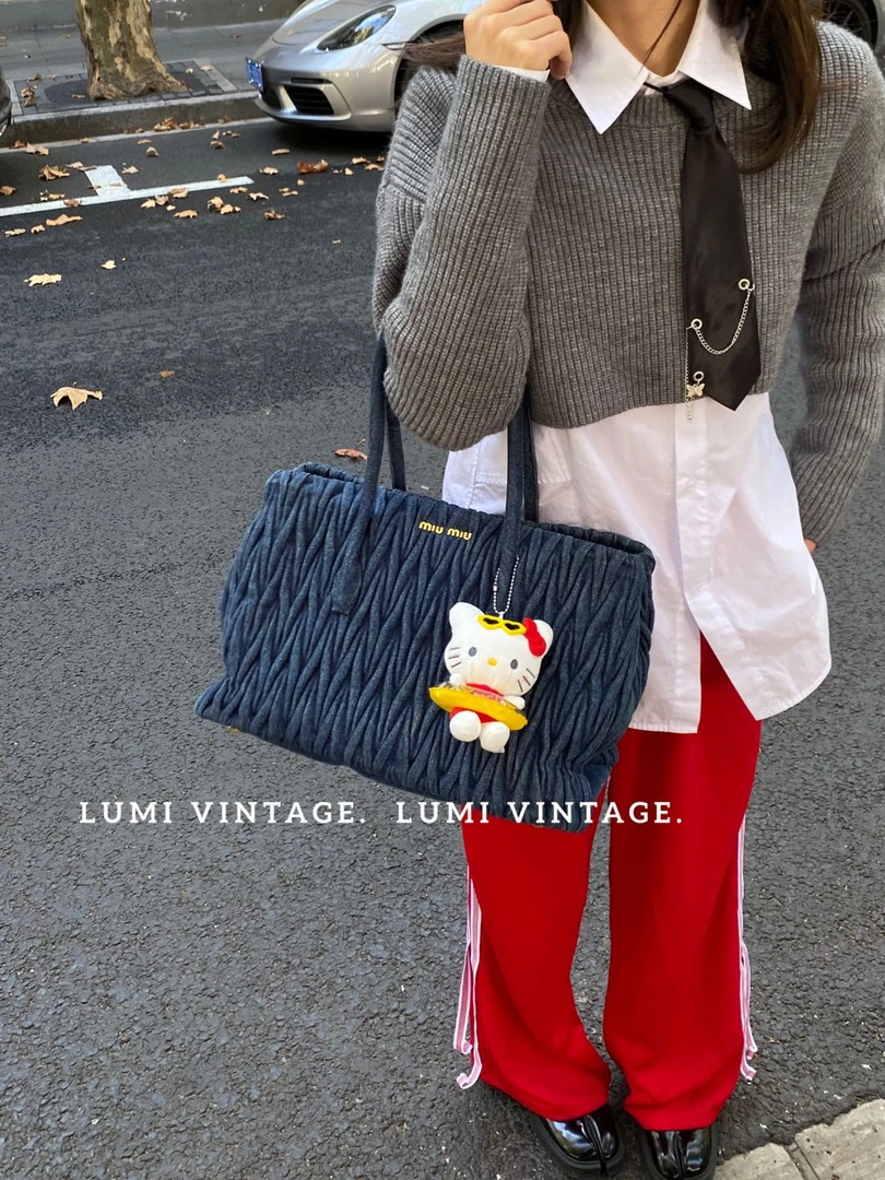 95新 MIU MIU/缪缪 蓝色牛仔褶皱托特包14284124