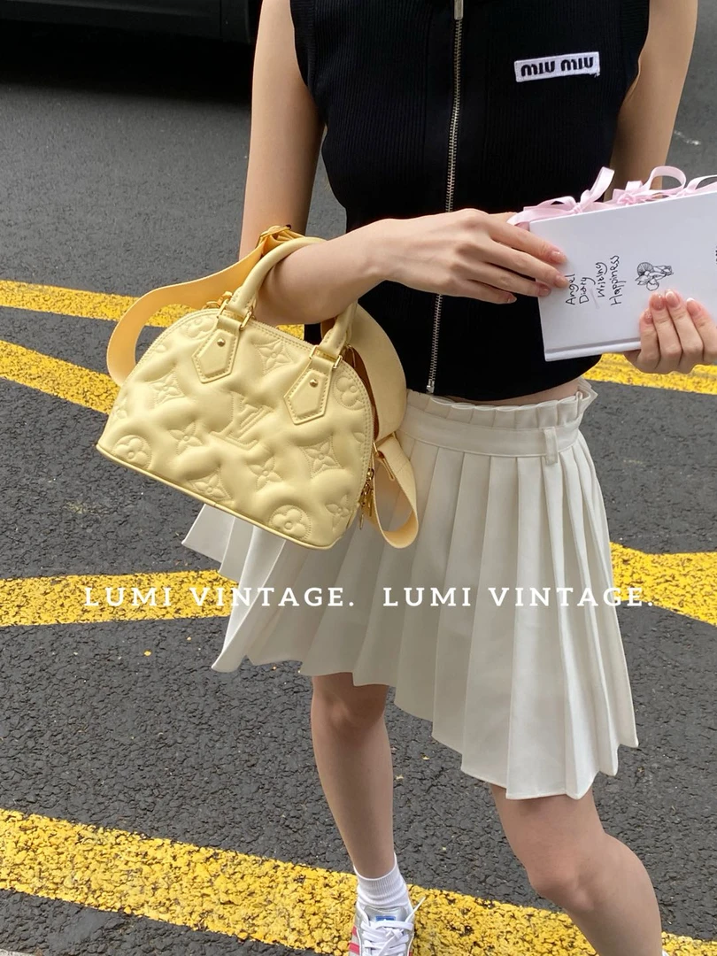 95新 LouisVuitton/路易威登 小鸡黄牛皮压纹alam手提包 32573248