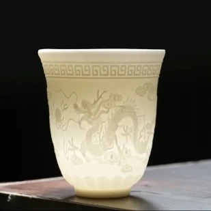 羊脂玉龙凤浮雕隐雕素烧主人杯
