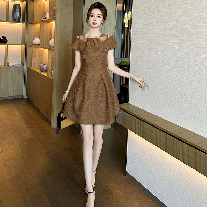 新款设计感圆领拼接收腰A字茶歇连衣裙30910