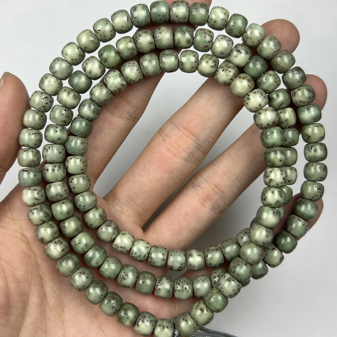 星月菩提大留白河豚6*7石玉料满绿原生态海南料108颗脖挂手串