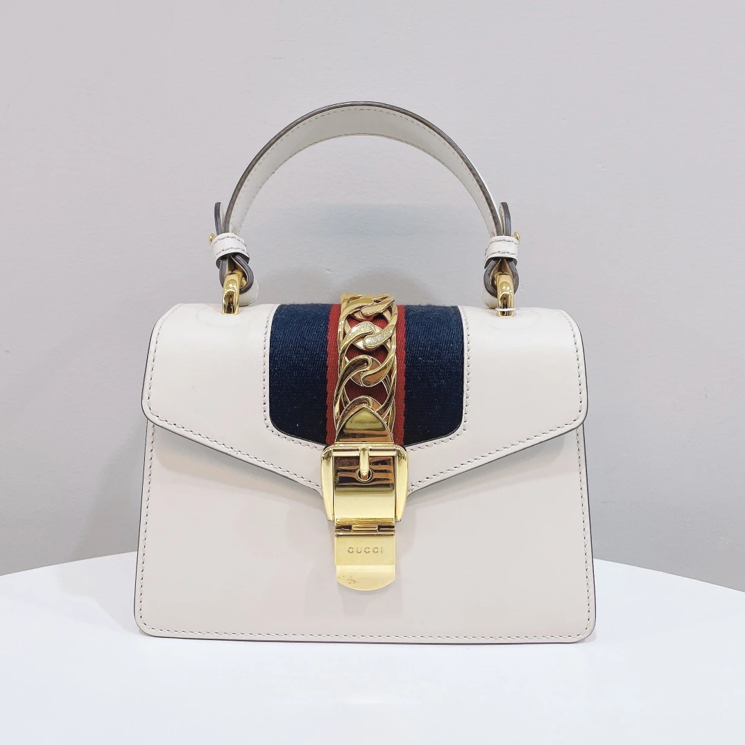 99新 GUCCI/古驰 塞尔维亚小号白色手提斜跨包/优品