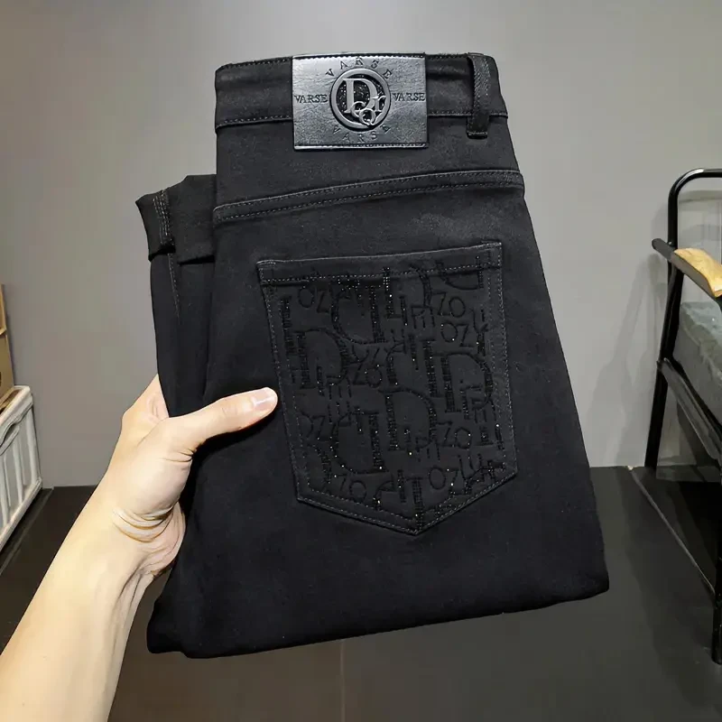 男牛仔裤子纯黑色修身小脚牛仔裤男显瘦腿长高端弹力重工贴钻长裤