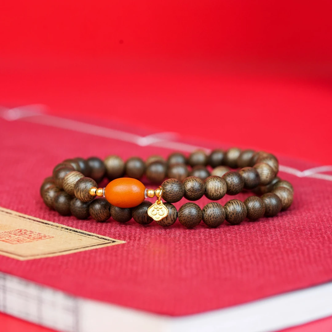 九沐沉香-绿棋楠0.6两圈设计款手串