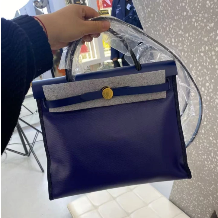 未使用 Hermes/爱马仕 lina/herbag蓝防水布包/z刻尘袋