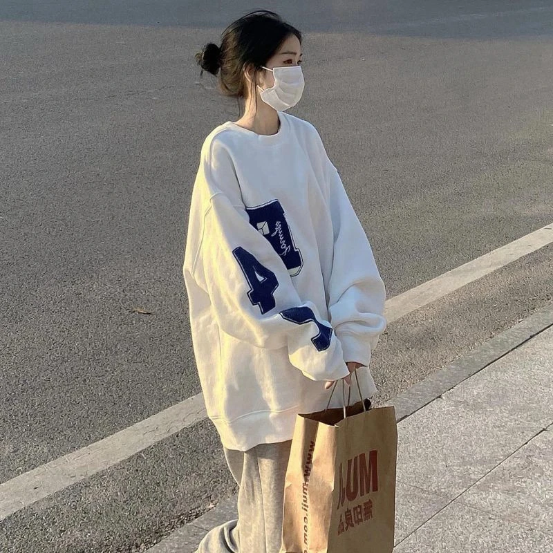白色时尚宽松流行网红款卫衣2025年新款百搭休闲中长款下衣失踪女