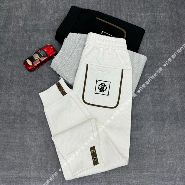 春季男士简约欧货轻奢时尚百搭舒适空气棉休闲束脚卫裤