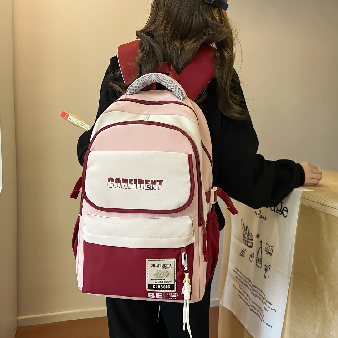 减负轻便书包女初中生高中学生新款大容量高颜值百搭小学生双肩包