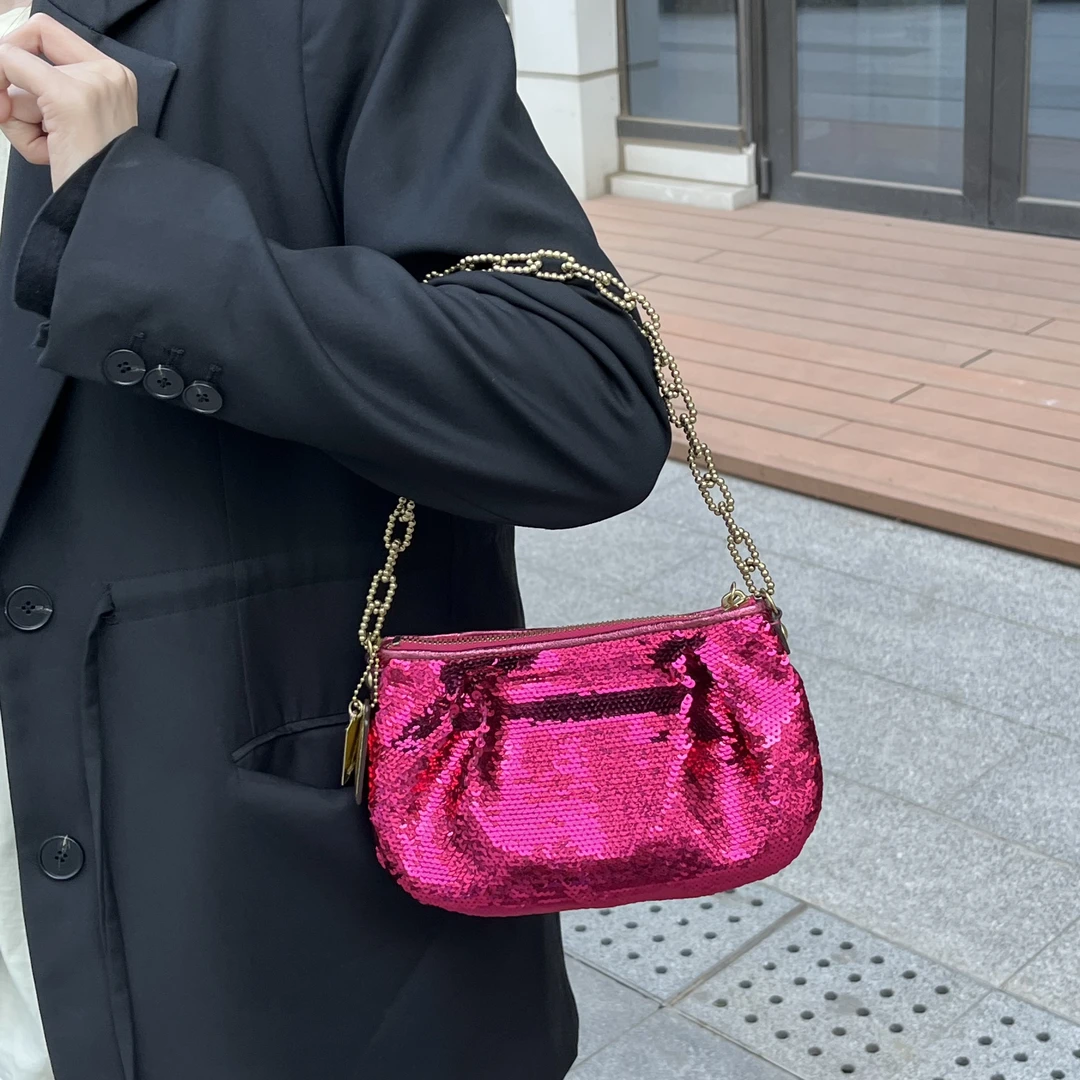 95新 COACH/蔻驰 阿白奢品/蔻驰 粉色亮片手拎包