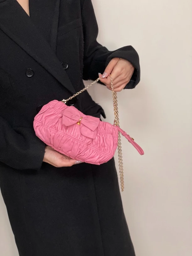 95新 Prada/普拉达 阿白奢品/Prada 粉色蝴蝶结手拿包