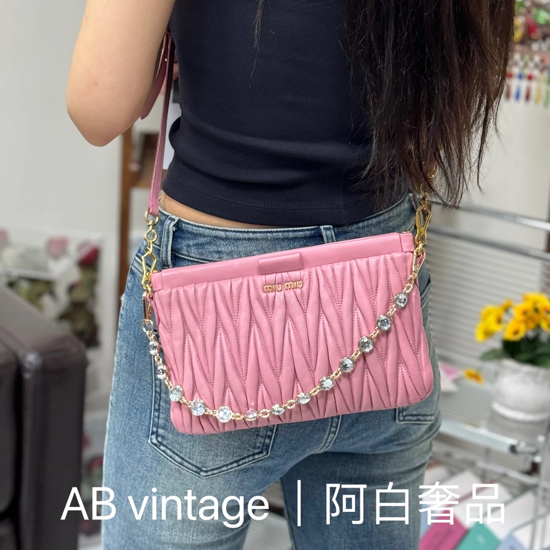 95新 MIU MIU/缪缪 阿白奢品/缪缪 粉色褶皱夹子包