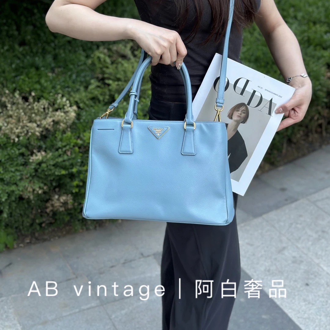 95新 Prada/普拉达 阿白奢品/中号蓝色单肩包