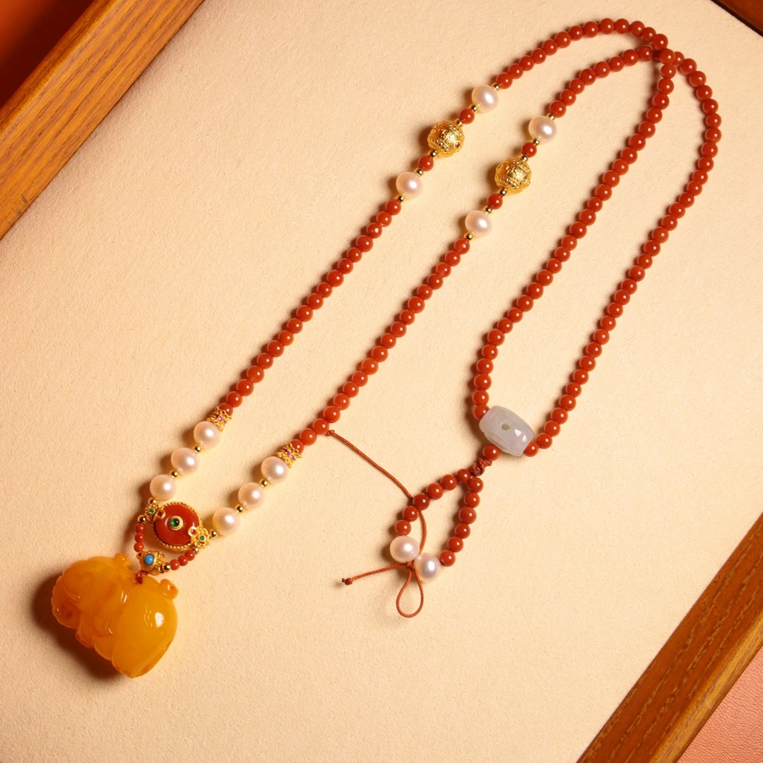 【心如珠宝】蜜蜡南红大象项链