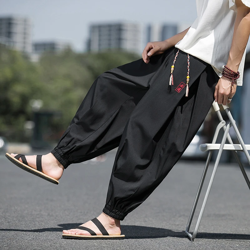 暗黑系痞帅休闲裤子男款小众设计感冰丝运动裤国潮刺绣宽松哈伦裤