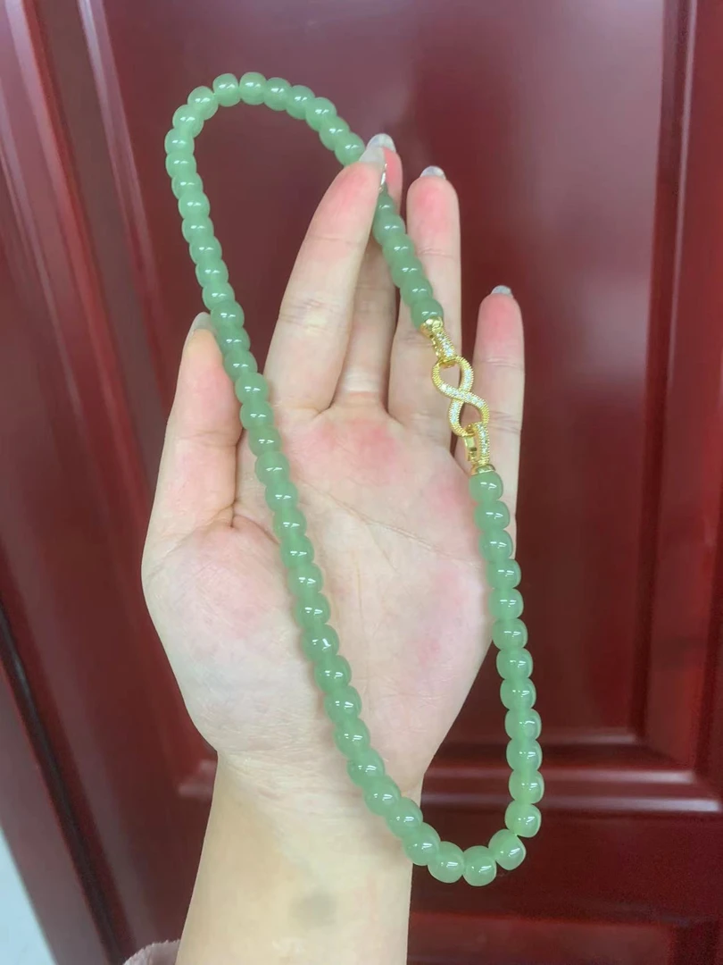 天然晴水老型东陵玉项链