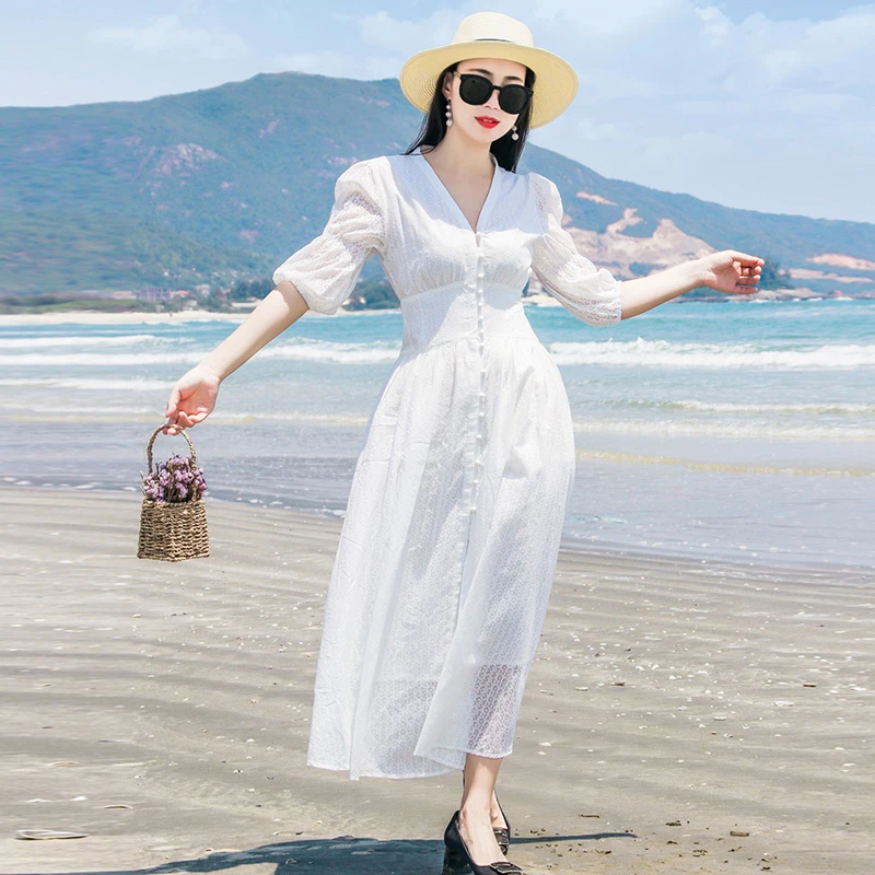 v领白色连衣裙长裙棉麻文艺范泡泡袖大摆度假沙滩裙圆点夏季新款