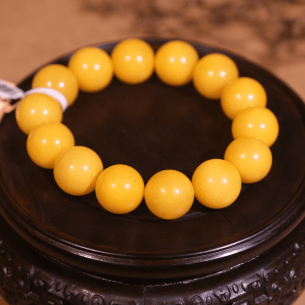 【新疆马爷珠宝】蜜蜡鸡油黄卡16手串-yx0000101