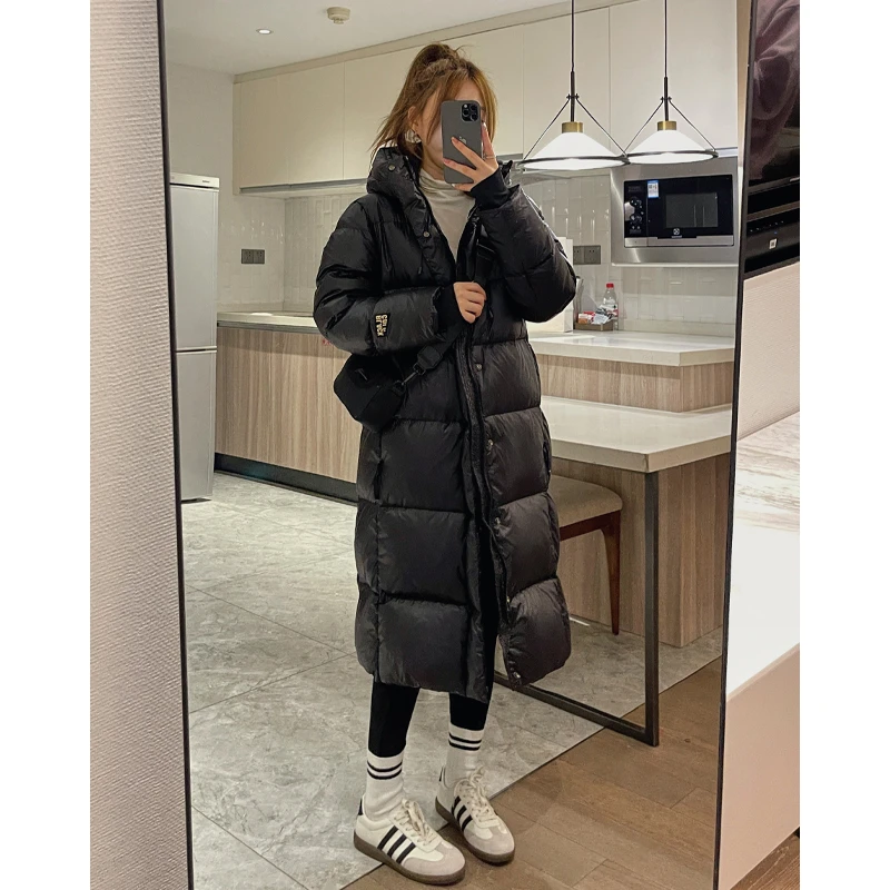 黑金羽绒服女中长款2023年冬季新款连帽保暖长款过膝白鹅绒外套