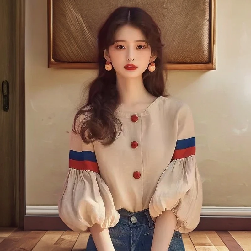 2025早秋新款法式小众设计感独特超好看洋气减龄杏色灯笼袖衬衫女