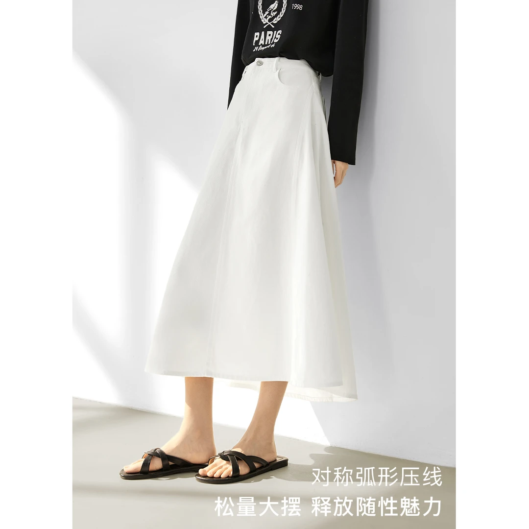 对白时髦百搭a字牛仔半身裙女2024春装新款设计感纯棉大摆中长裙