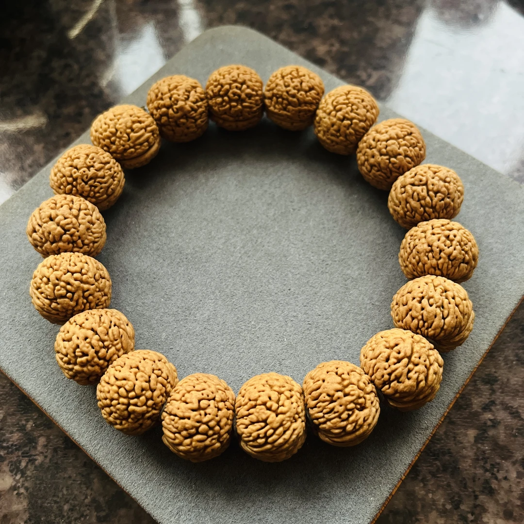 桃核龙鳞凤尾手持