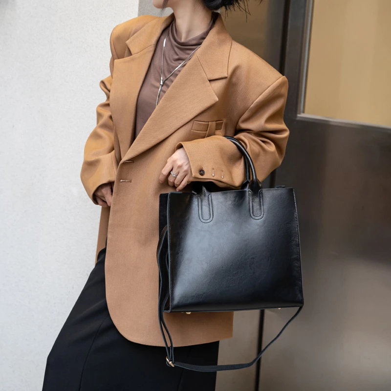 高级感纯牛皮大容量斜挎手提包女百搭2024春夏新款真皮竖款托特包