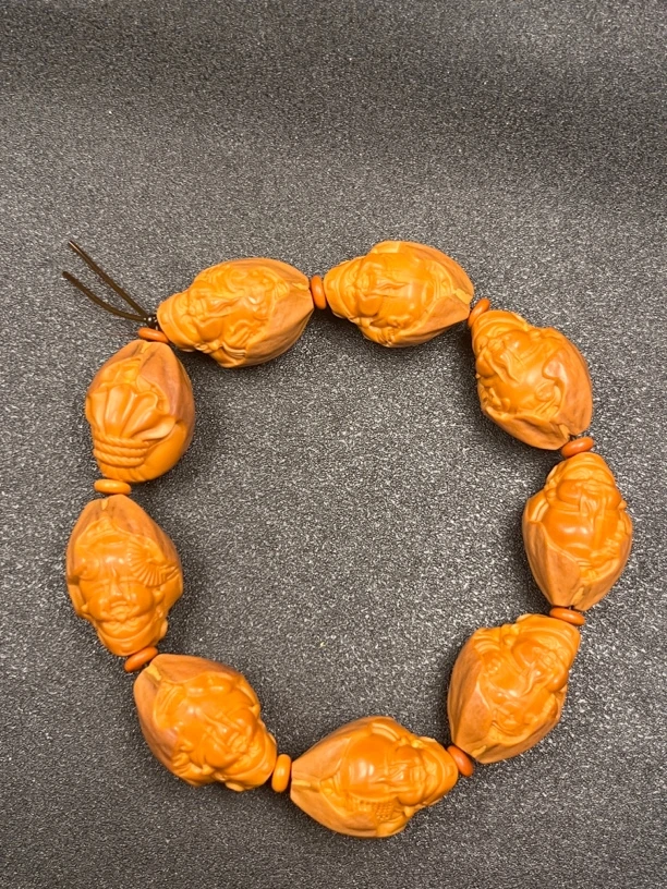 橄榄核雕文玩包衣元甲财神手串