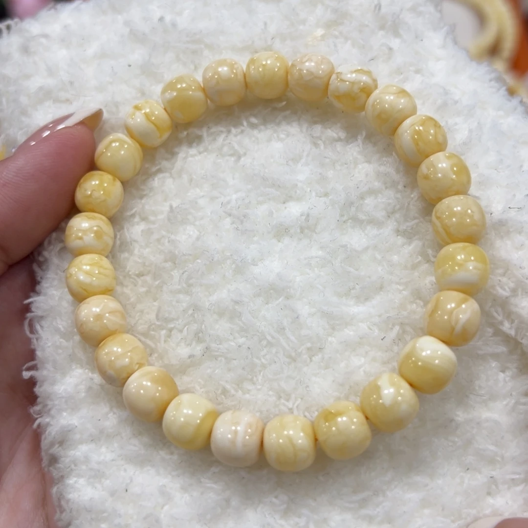 蜜蜡裸石未镶嵌丁*8.5m橘底妖花手串