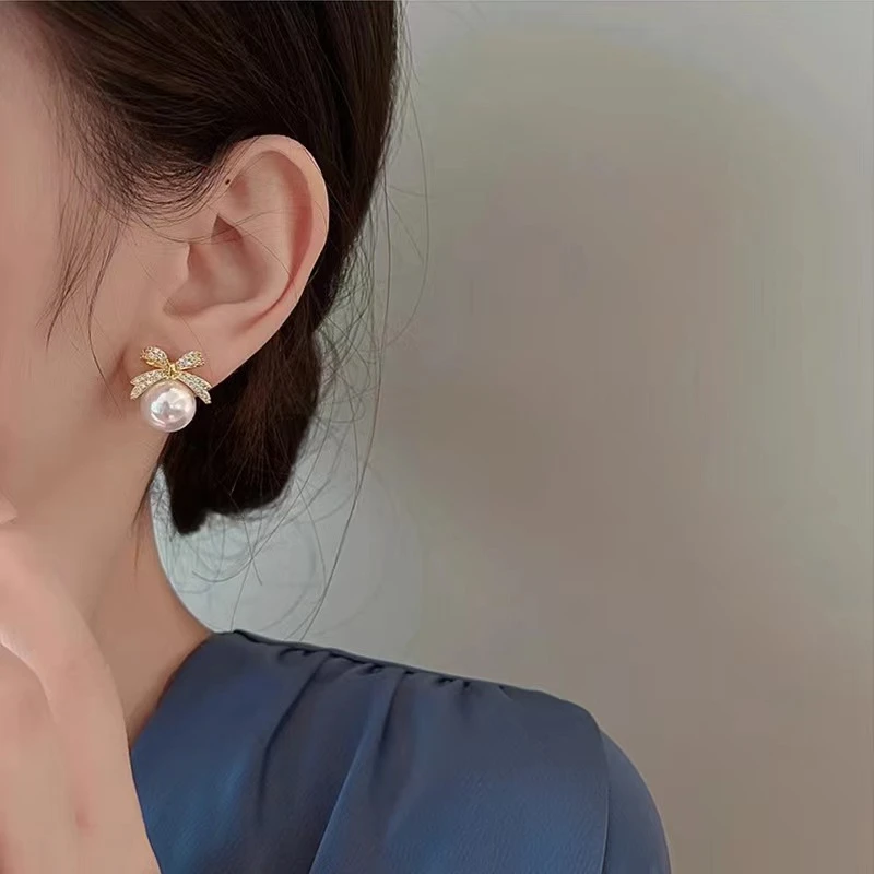 铜合金耳饰 韩国蝴蝶结珠珠镶钻气质小众轻奢高级设计感耳钉【652】