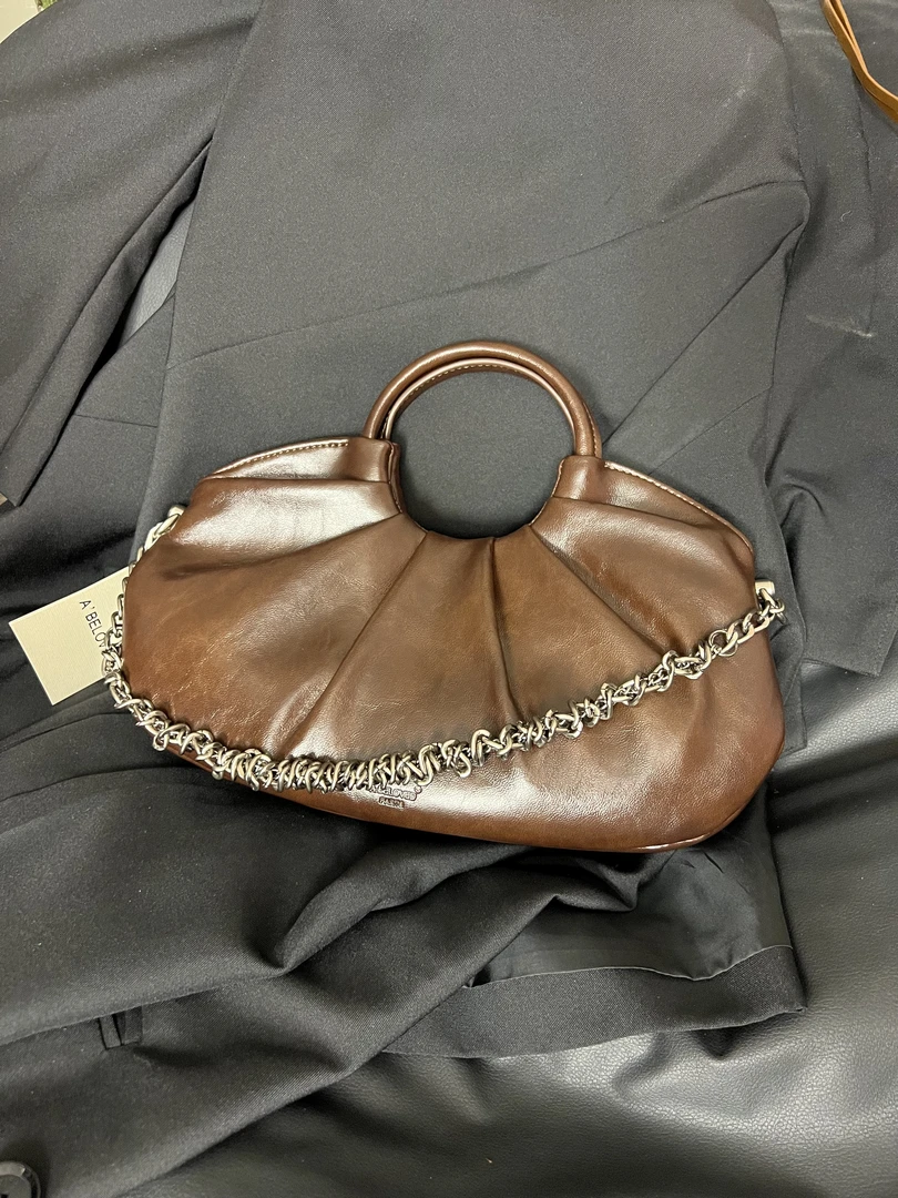 24新款休闲时尚单肩斜跨包7005