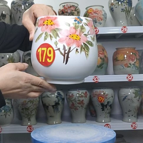 罐高度是15内口径是11.5有孔。