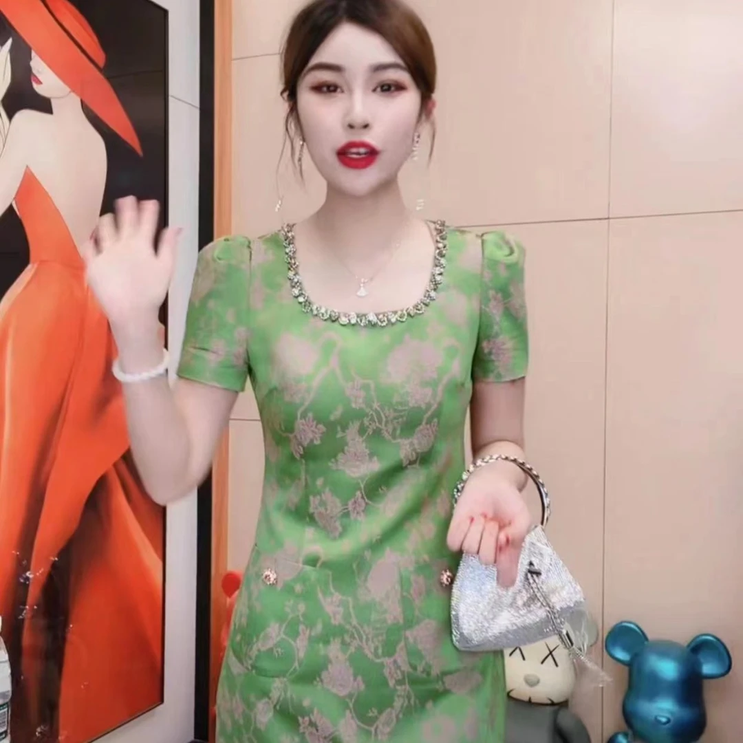 M9A83257新款2025绿色显瘦气质高级感洋气连衣裙
