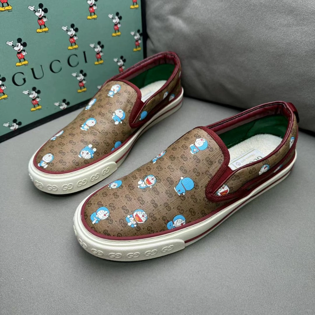 95新 GUCCI/古驰 棕色双G老花哆啦A梦休闲时尚百搭一脚蹬 41码