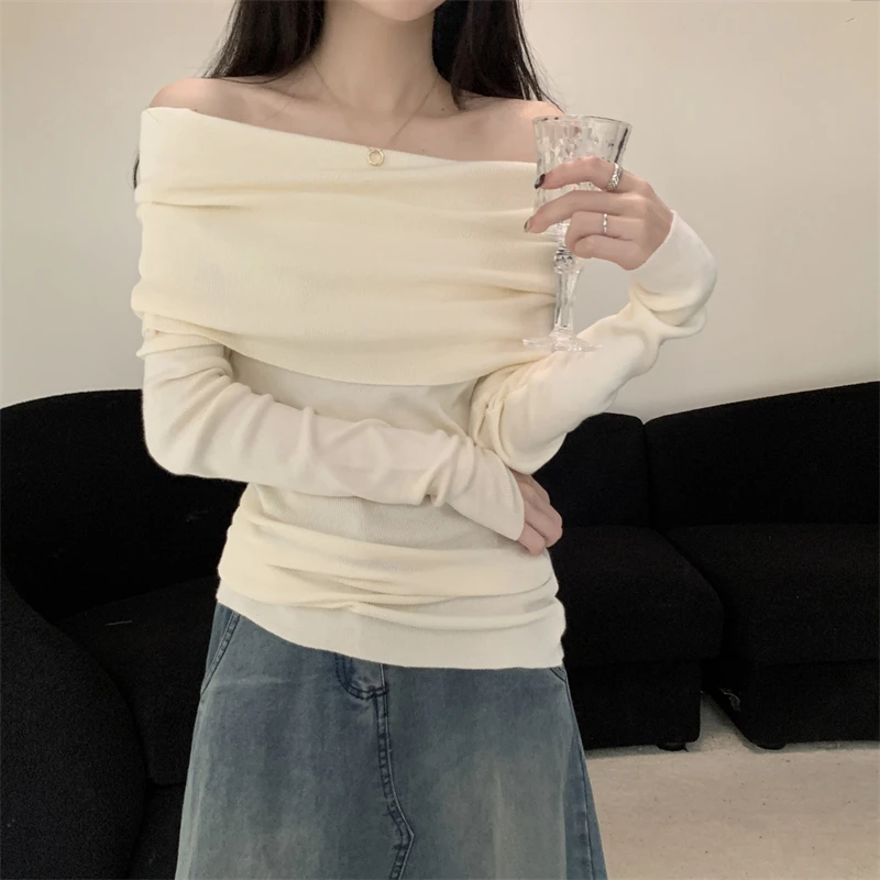 秋季新款一字肩针织衫女设计感露肩显瘦长袖上衣