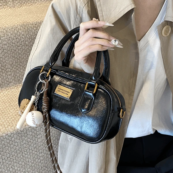 高级质感小包包女2024秋冬新款通勤波士顿手提枕头包设计感斜挎包