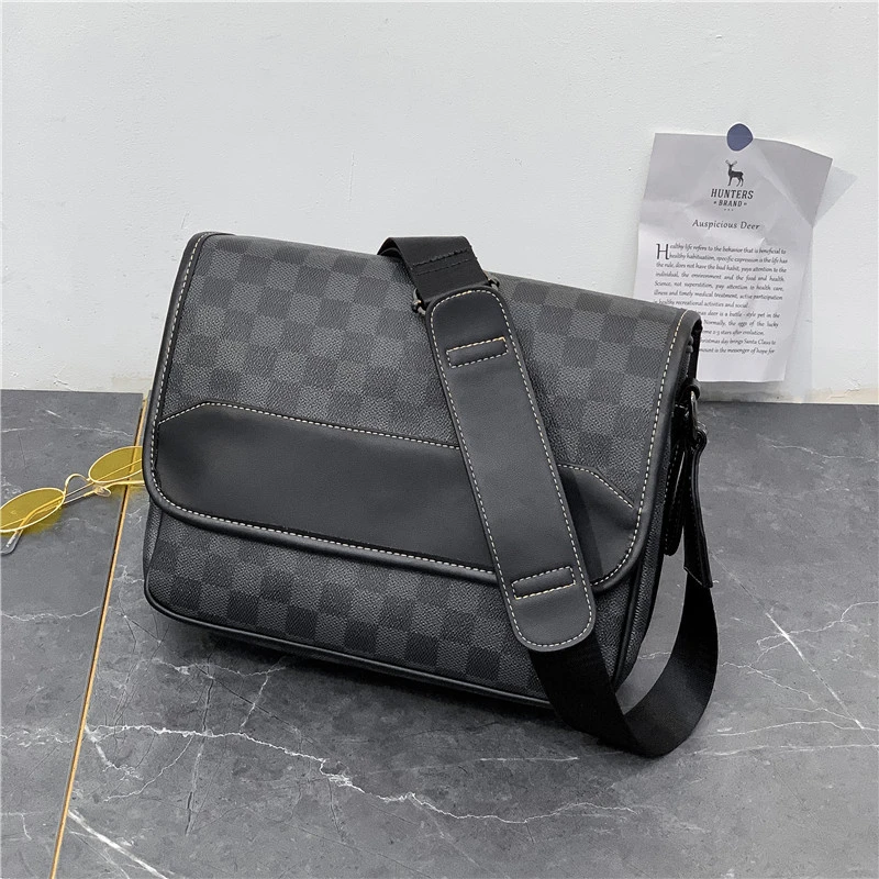 潮流男士单肩包商务休闲时尚男士格子牛皮多隔层男包斜挎包百搭