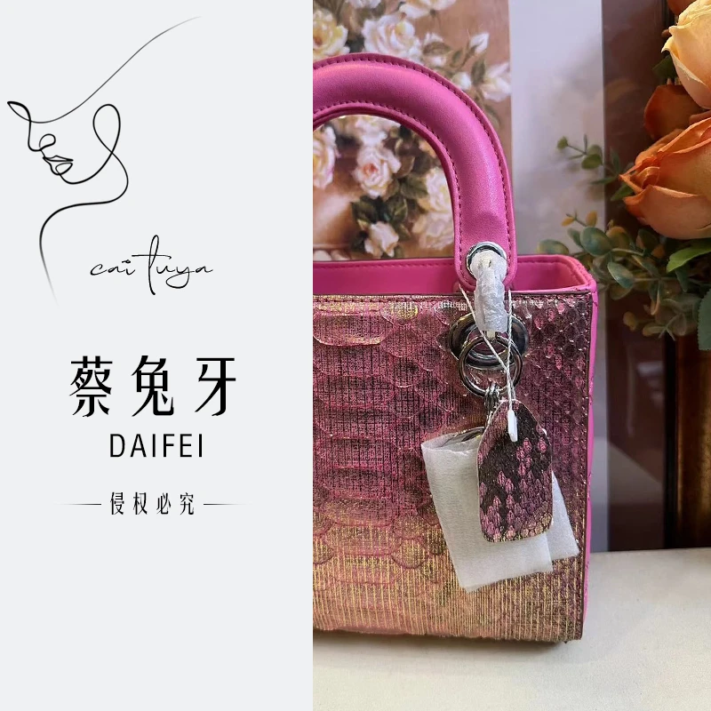 [蔡兔牙高端定制]新款玫红色蟒蛇纹戴妃女士手提斜挎包SY025