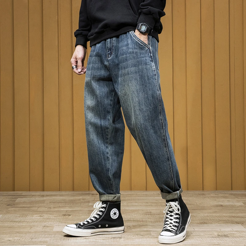 秋季新款宽松直筒牛仔裤男士高端哈伦裤潮牌胖子小脚锥形萝卜裤子