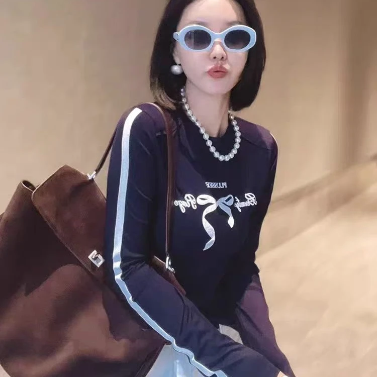 036059欧货休闲蝴蝶结显瘦打底衫