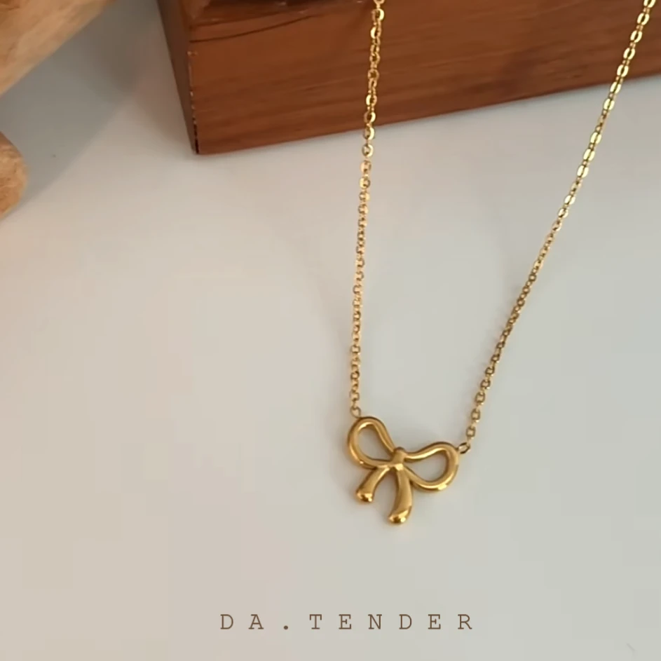 钛钢项链 金色蝴蝶结项链