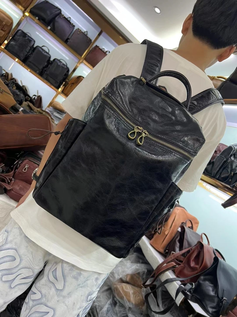 休闲手工牛皮中性复古双肩包